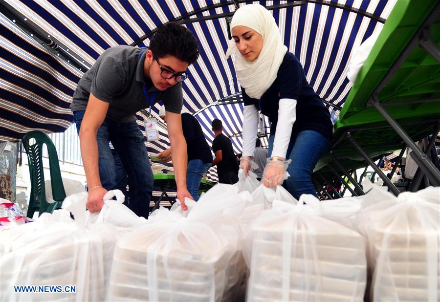 SYRIA-DAMASCUS-RAMADAN-CHARITY-MEALS