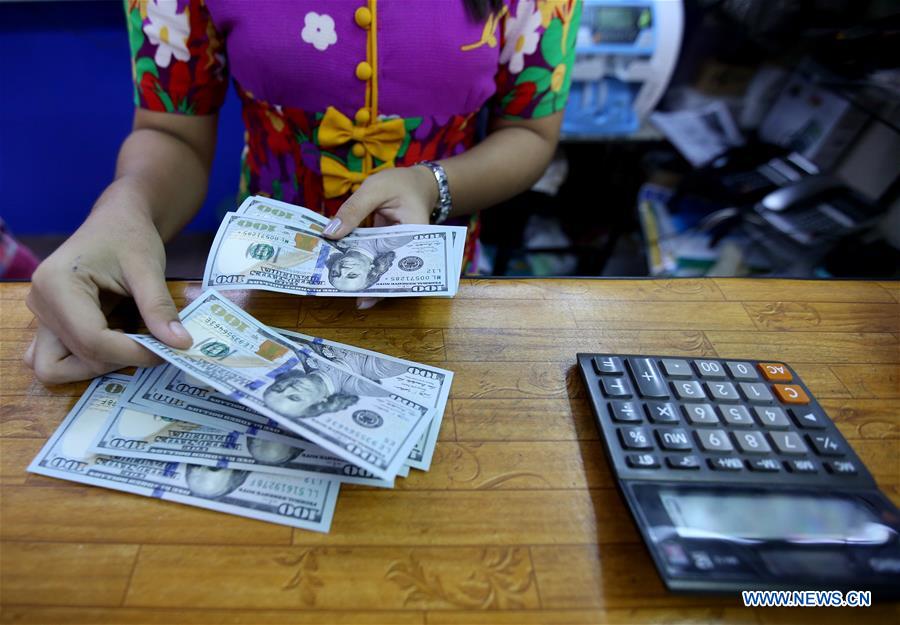 MYANMAR-YANGON-FOREIGN CURRENCY EXCHANGE-RAISING