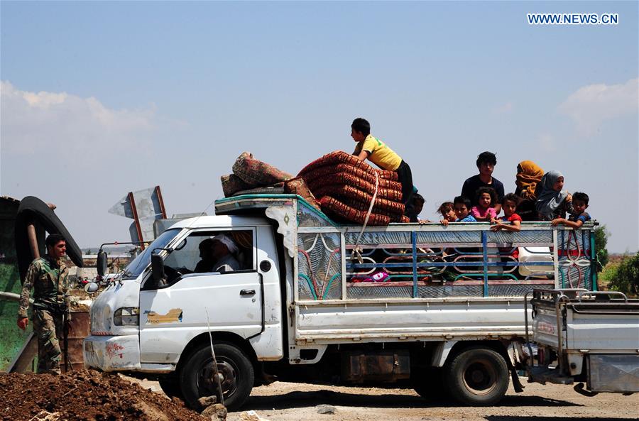 SYRIA-DARAA-CIVILIANS-RETURN-HOME