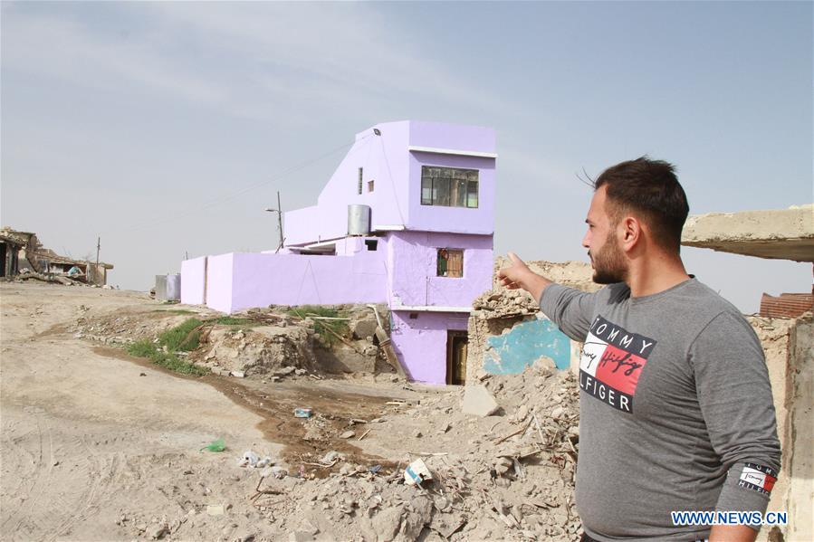 IRAQ-MOSUL-1ST HOUSE AMONG RUBBLE