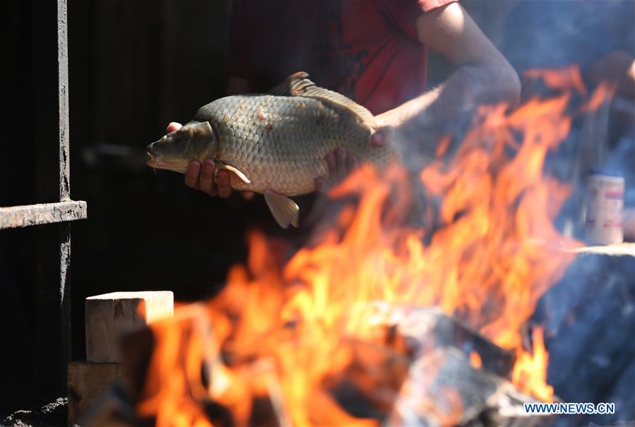 IRAQ-BAGHDAD-MASGOUF-GRILLED FISH