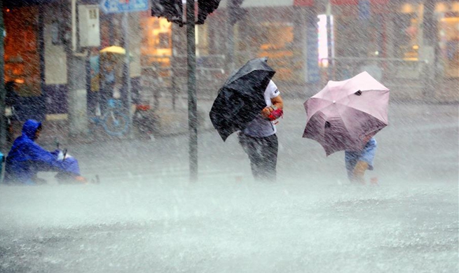 Death toll rises to 22 as Typhoon Lekima sweeps through east China